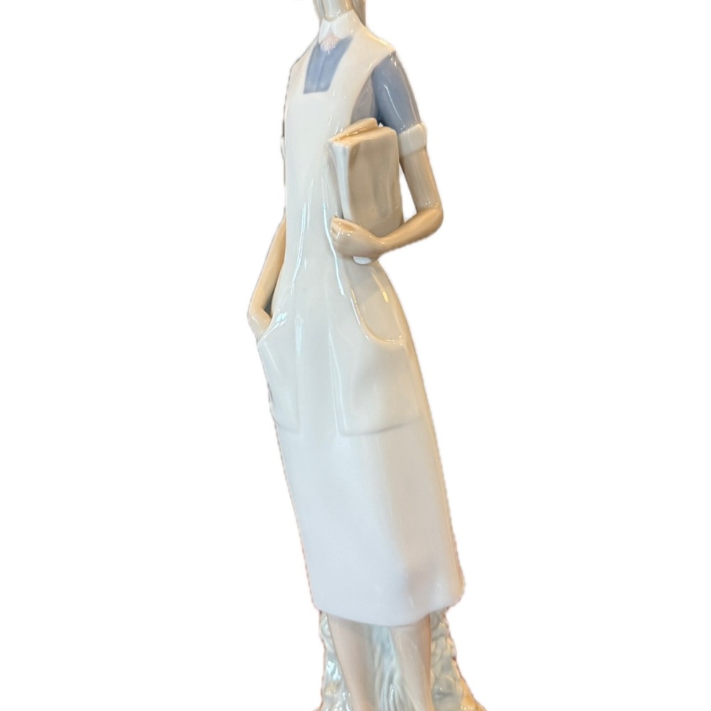 Lladro White and Blue Figurine